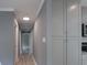 Long hallway with vinyl flooring and grey walls at 251 Hall Spencer Rd, Catawba, SC 29704