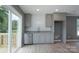 Kitchen featuring stainless steel appliances, granite countertops, and access to outdoor deck at 251 Hall Spencer Rd, Catawba, SC 29704