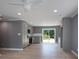 Bright kitchen with modern appliances, gray cabinets, and sliding glass doors at 251 Hall Spencer Rd, Catawba, SC 29704