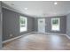 Bright living room with new flooring, fresh paint, and updated ceiling fan at 251 Hall Spencer Rd, Catawba, SC 29704
