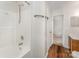 Bathroom featuring a tub/shower combo and wood vanity at 2903 Rockingham Sw Ct, Concord, NC 28025