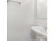 Contemporary half-bathroom featuring a sleek wall-mounted sink, modern fixtures, and a minimalist design at 2903 Rockingham Sw Ct, Concord, NC 28025