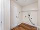 Laundry room equipped with washer and dryer hookups and storage shelves at 2903 Rockingham Sw Ct, Concord, NC 28025