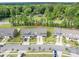 Aerial view of modern townhomes surrounded by lush greenery and mature trees at 348 Zocalo Dr, Gastonia, NC 28056