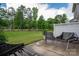 A backyard with privacy fence and picturesque green space is great for entertaining or relaxing at 348 Zocalo Dr, Gastonia, NC 28056