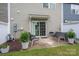 A cozy outdoor patio offers a perfect spot for relaxation and entertaining at 348 Zocalo Dr, Gastonia, NC 28056
