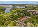 Aerial view of the home's location, near a lake and surrounded by lush greenery at 376 Delburg St, Davidson, NC 28036