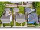 Birds eye view of the roof and yard with green grass and a concrete patio at 376 Delburg St, Davidson, NC 28036