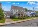 Charming two-story home with manicured landscaping and a covered front porch at 376 Delburg St, Davidson, NC 28036