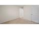Bedroom with neutral carpeting, white walls, and access to the en suite bathroom at 4116 Lurelin Ln, Charlotte, NC 28262