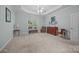 Carpeted bedroom features a window, ceiling fan and classic interior design at 422 Drake Ln, Salisbury, NC 28146