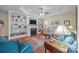 Inviting living room with built-in bookshelves, fireplace, and a comfortable seating area at 422 Drake Ln, Salisbury, NC 28146