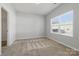Bedroom features neutral carpet, natural light, and ample closet space at 4226 Lotts Pl, Rock Hill, SC 29732