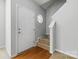 Inviting entryway featuring hardwood floors and a staircase to the second floor at 4226 Lotts Pl, Rock Hill, SC 29732