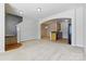 Inviting living room with an arched doorway leading to a kitchen and staircase at 4226 Lotts Pl, Rock Hill, SC 29732