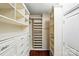 Spacious walk-in closet equipped with ample shelving and drawers for organizing wardrobes at 43041 Mimosa Ct, Fort Mill, SC 29707