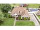 Spacious home with a well-maintained lawn, featuring a lush landscape and charming curb appeal at 4406 Atkinson Way, Monroe, NC 28110