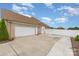 Exterior shot of home's garage and driveway and side access at 4406 Atkinson Way, Monroe, NC 28110