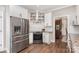 Modern kitchen with stainless steel appliances and white cabinetry at 4406 Atkinson Way, Monroe, NC 28110