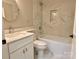 Bathroom featuring a tub-shower combination with white tile and a modern vanity at 456 Brook Valley Ne Ct, Concord, NC 28025