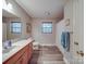 Traditional-style bathroom featuring a single sink vanity, a toilet, and a shower with curtain at 4620 Binwhe Ln, Gastonia, NC 28052