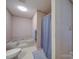 Clean bathroom with a tub, shower, and a neutral color scheme at 4620 Binwhe Ln, Gastonia, NC 28052