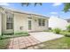 Outdoor patio offers a tranquil space with mature plants and grass at 4719 Sahalee Ln, Charlotte, NC 28216