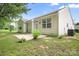 Cozy backyard patio with lush greenery perfect for outdoor relaxation at 4719 Sahalee Ln, Charlotte, NC 28216
