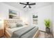 Cozy bedroom featuring a ceiling fan, carpet, and a window at 4719 Sahalee Ln, Charlotte, NC 28216