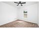 Bedroom with carpet, ceiling fan, and a window at 4719 Sahalee Ln, Charlotte, NC 28216