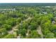 Aerial view highlighting the neighborhood's lush greenery and winding roads at 4846 Deer Cross Trl, Charlotte, NC 28269