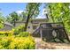 View of the home's deck and the lush backyard, showing the home's exterior at 4846 Deer Cross Trl, Charlotte, NC 28269