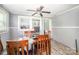 Dining area with a wooden table and chairs; large window provides natural light at 511 W Finger St, Maiden, NC 28650
