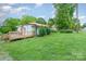 Side view of home showing the wooden deck and yard at 511 W Finger St, Maiden, NC 28650