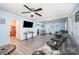 View of the living room showcasing updated flooring and comfortable seating at 511 W Finger St, Maiden, NC 28650