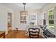 Cozy dining area with hardwood floors, a table with chairs, and a window seat at 512 Forest Ln, Rock Hill, SC 29730