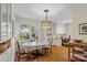 Charming dining area with hardwood floors, a table with chairs, and a built-in workspace at 512 Forest Ln, Rock Hill, SC 29730