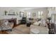Cozy living room with fireplace, neutral colors, and plenty of natural light creating a warm atmosphere at 512 Forest Ln, Rock Hill, SC 29730