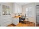 Well-lit office space with built-in cabinets, a desk, and an office chair at 512 Forest Ln, Rock Hill, SC 29730