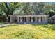Charming single-story home with a covered front porch and a convenient carport at 5715 Coulee Pl, Charlotte, NC 28217