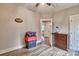 Empty bedroom featuring wood-look flooring and natural light at 6650 Highway 341 Hwy, Kershaw, SC 29067