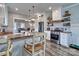 Eat-in kitchen featuring stainless steel appliances, butcher block countertops, and white cabinets at 6650 Highway 341 Hwy, Kershaw, SC 29067