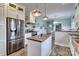 Modern kitchen with stainless steel appliances, a wooden island, and stylish lighting at 6650 Highway 341 Hwy, Kershaw, SC 29067