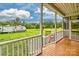 Relaxing screened porch overlooking a spacious yard, perfect for enjoying the outdoors at 6650 Highway 341 Hwy, Kershaw, SC 29067