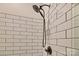 Shower stall with rainfall shower head and white tiled walls at 6650 Highway 341 Hwy, Kershaw, SC 29067