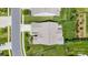 An aerial view of a single Gathering home featuring a well manicured lawn and neutral colored roof at 7016 Bareland Rd, Fort Mill, SC 29707