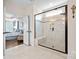 Bright bathroom features glass shower with seating and tile surround at 7016 Bareland Rd, Fort Mill, SC 29707
