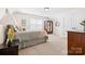 A bedroom with carpet flooring, a window, and a wardrobe at 7016 Bareland Rd, Fort Mill, SC 29707
