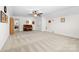 Inviting bedroom with plush carpeting, a ceiling fan, and ample space for furnishings at 7016 Bareland Rd, Fort Mill, SC 29707