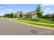 View of the home from the street, showcasing its landscaped front yard and neighborhood setting at 7016 Bareland Rd, Fort Mill, SC 29707